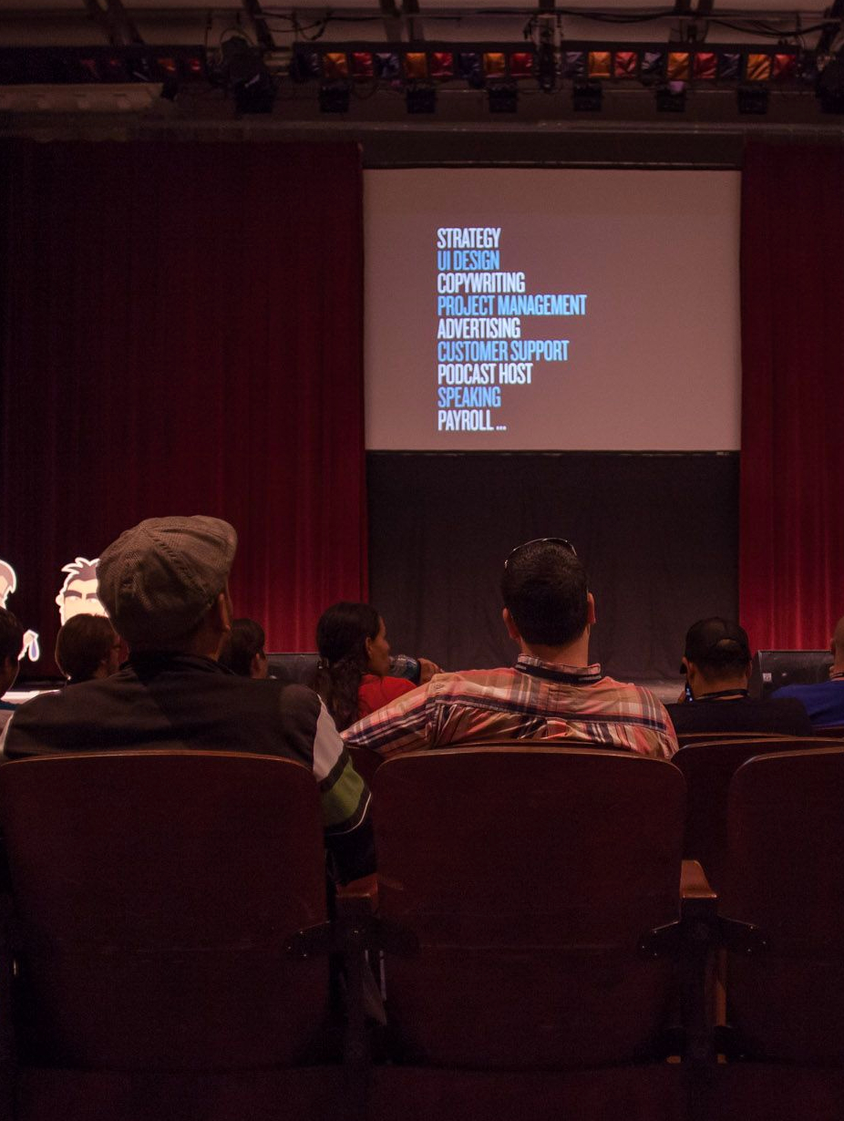 People watching a conference talk