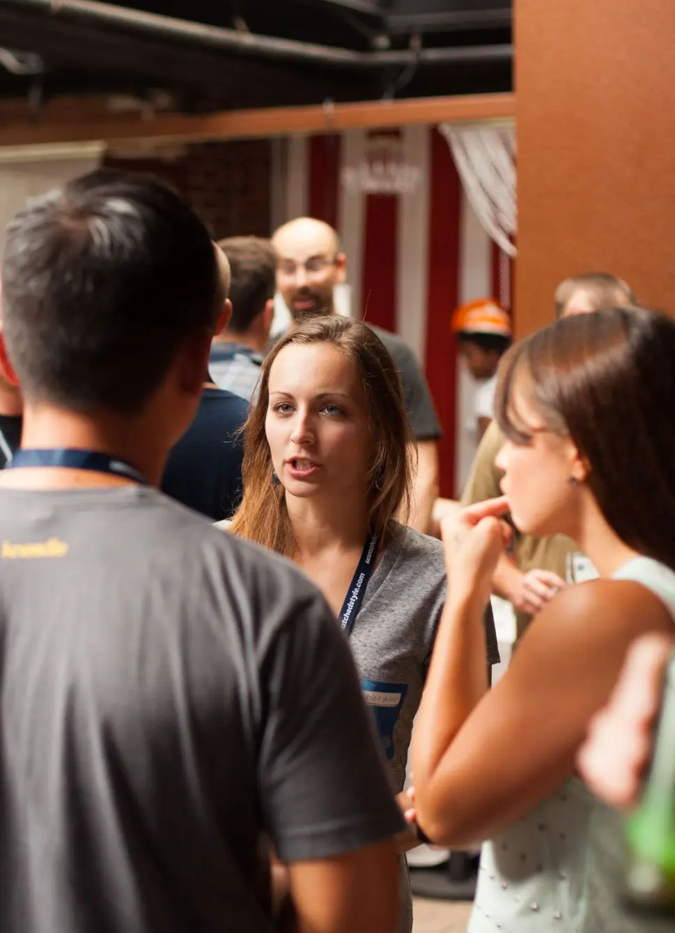 Attendees chatting at the afterparty